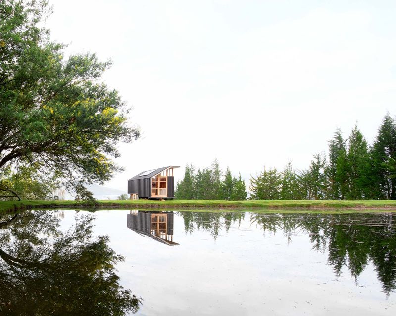 Building on Working Land: A Compact Retreat Among Ecuador's Pastoral Foothills
