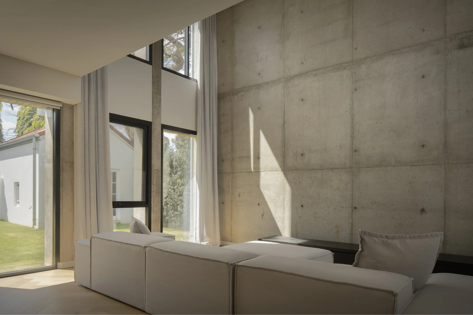 George Kouparitsas Architects Extend Dohori House with Cast-Concrete Volumes Behind Its Preserved Pre-War Facade