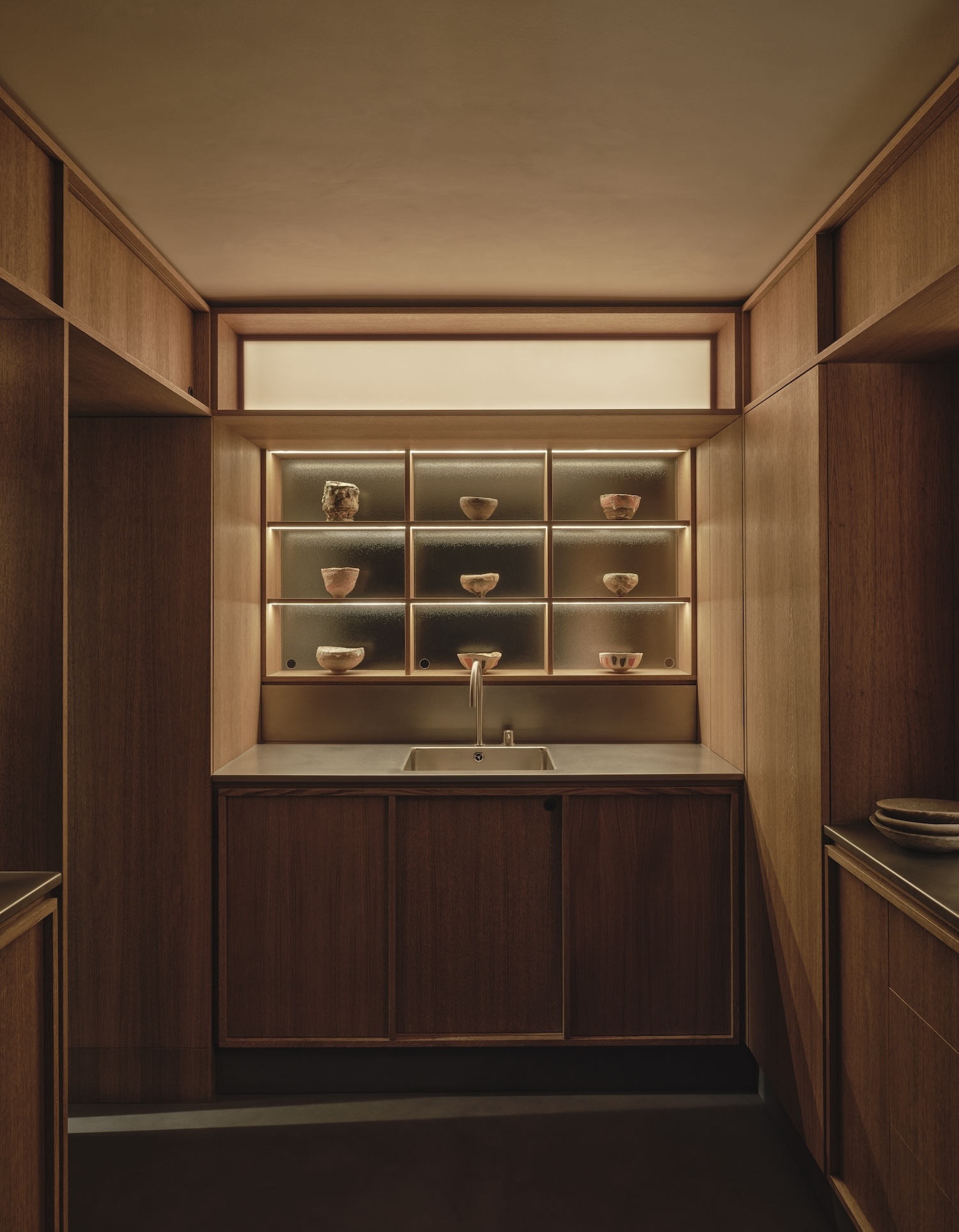 Tectonics Of Stillness: Material Restraint And Spatial Inversion In Heion House
