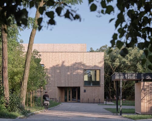 How a Timber-Clad Library Preserves the Informal Logic of a Warsaw Clearing