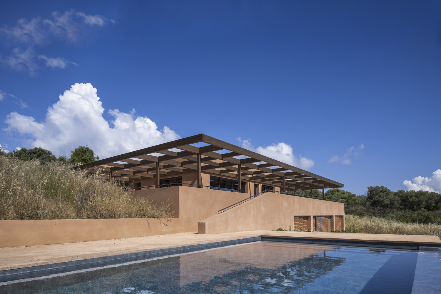 Top Picks - 7 Terracotta Houses Celebrating Texture, Light, And Earth
