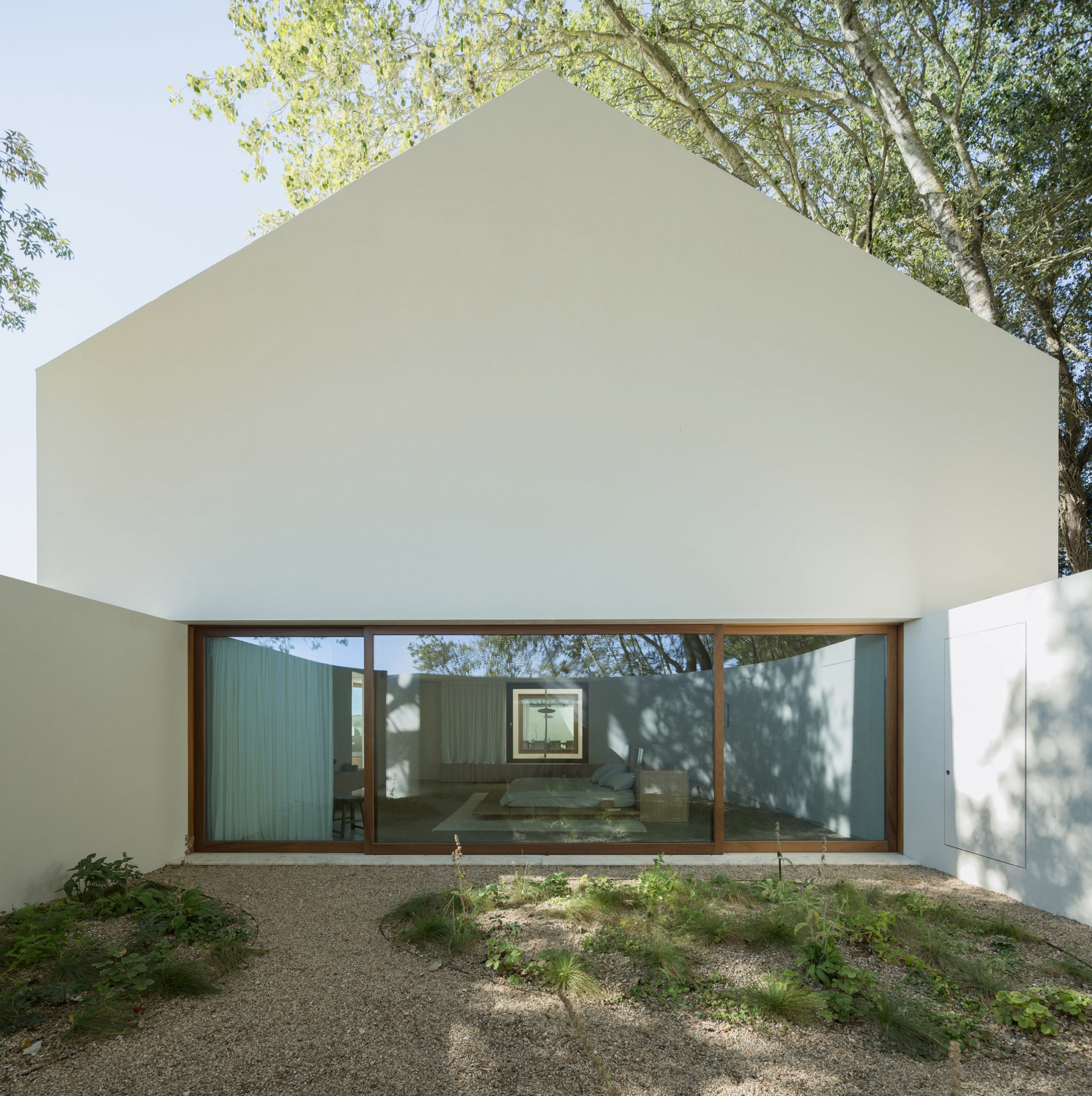 Symmetry In Sound: A Winery Reborn As A Minimalist Home And Studio For Two Musicians