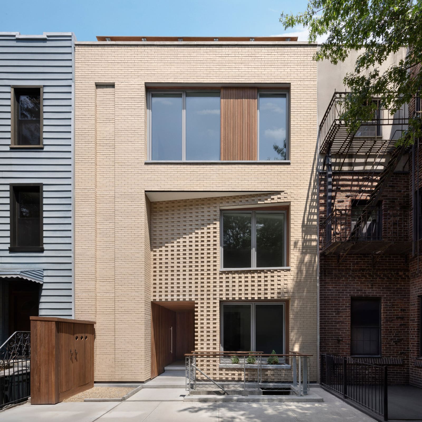 How Brick Geometry Shapes Two Homes Within a Single Greenpoint Facade