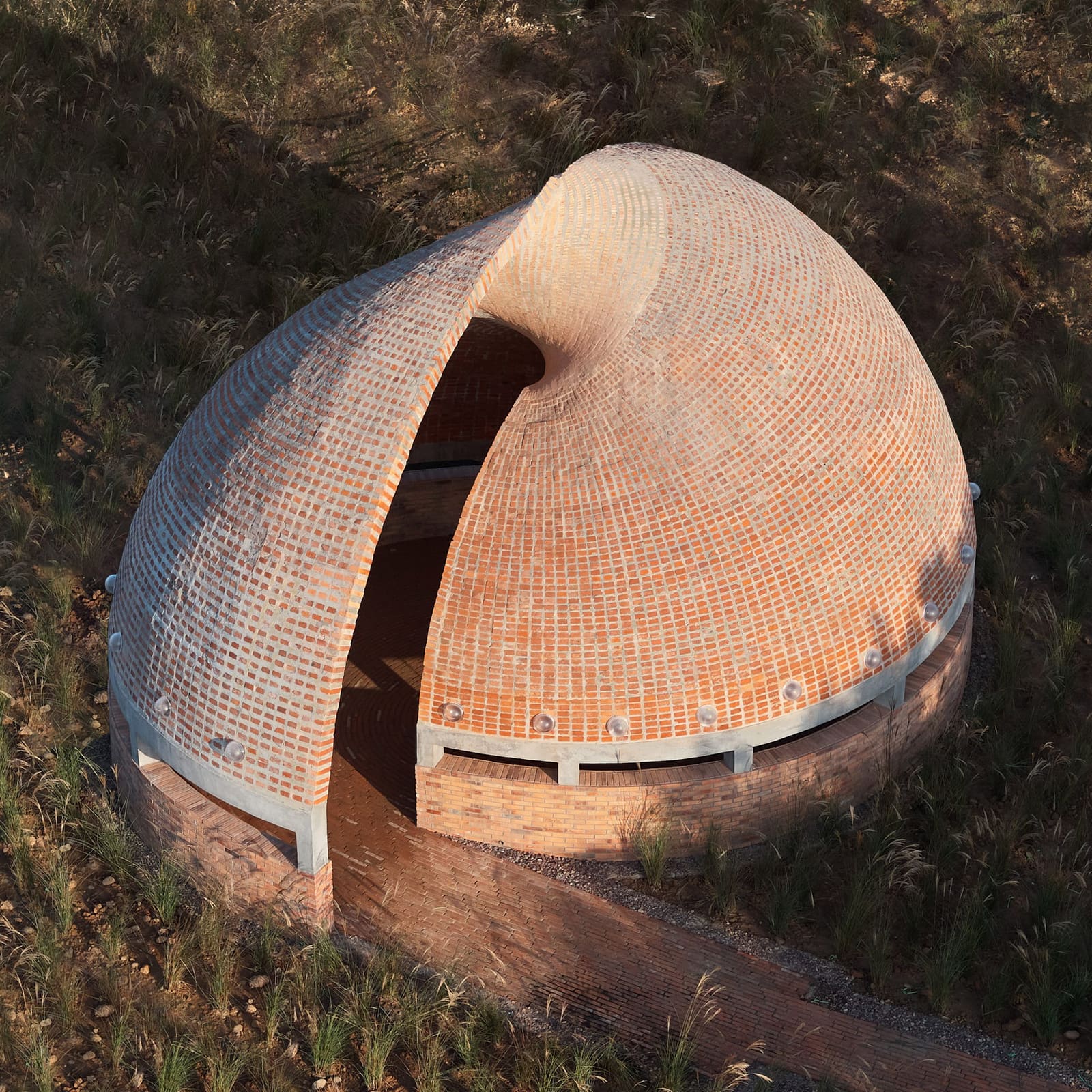 When Brick Becomes Fluid: Eight Projects That Bend the Rules