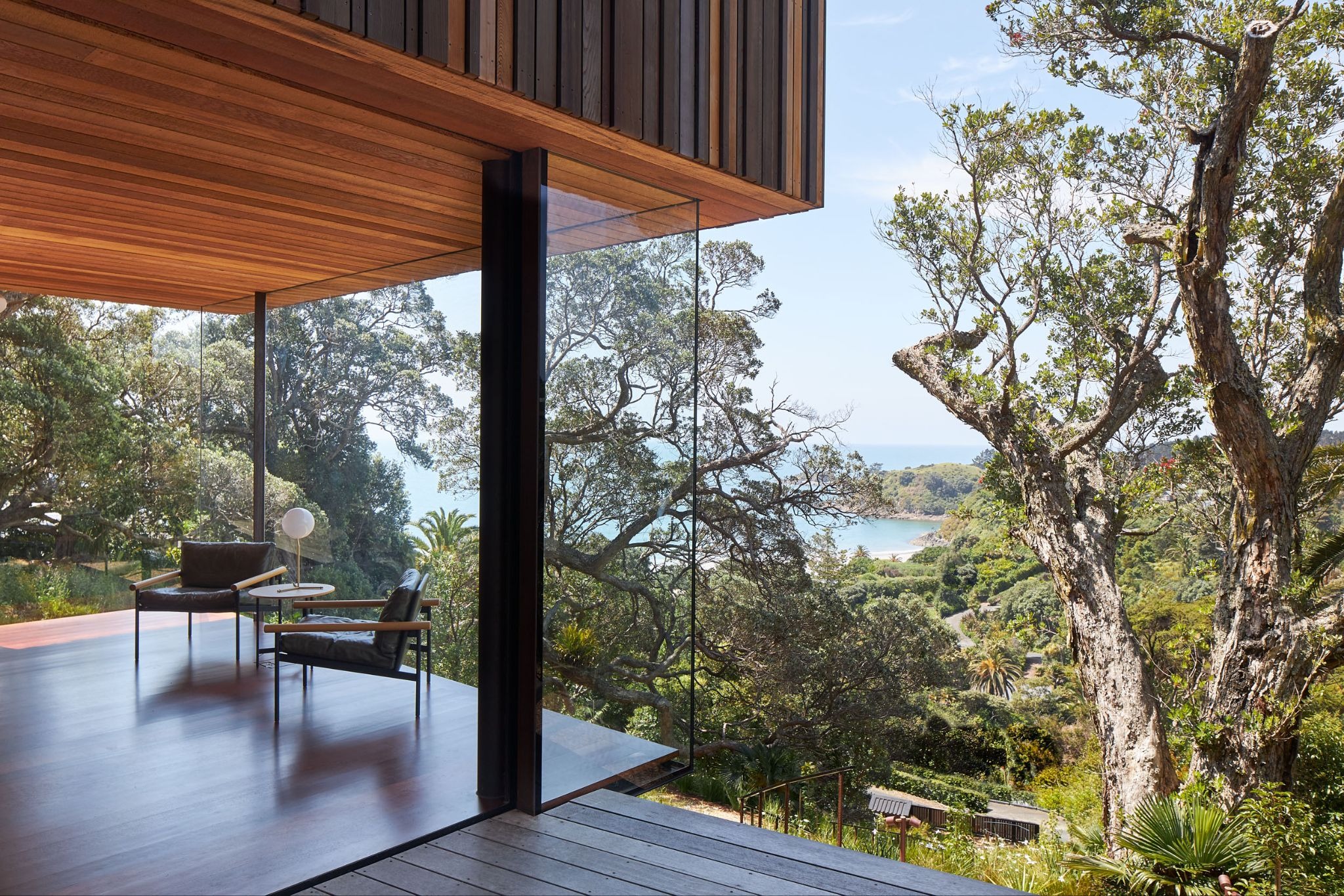 MacKay Curtis Suspends a Timber Sleeping Box Over a Fully Glazed Living Platform