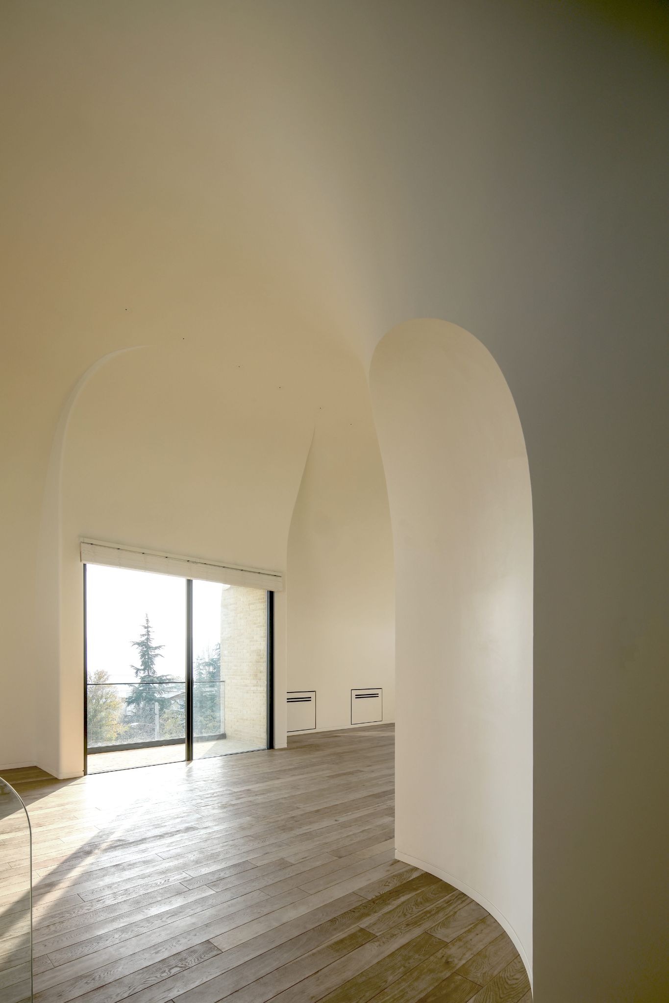 Next Office Bends the Persian Courtyard into the Sky at Lavasan