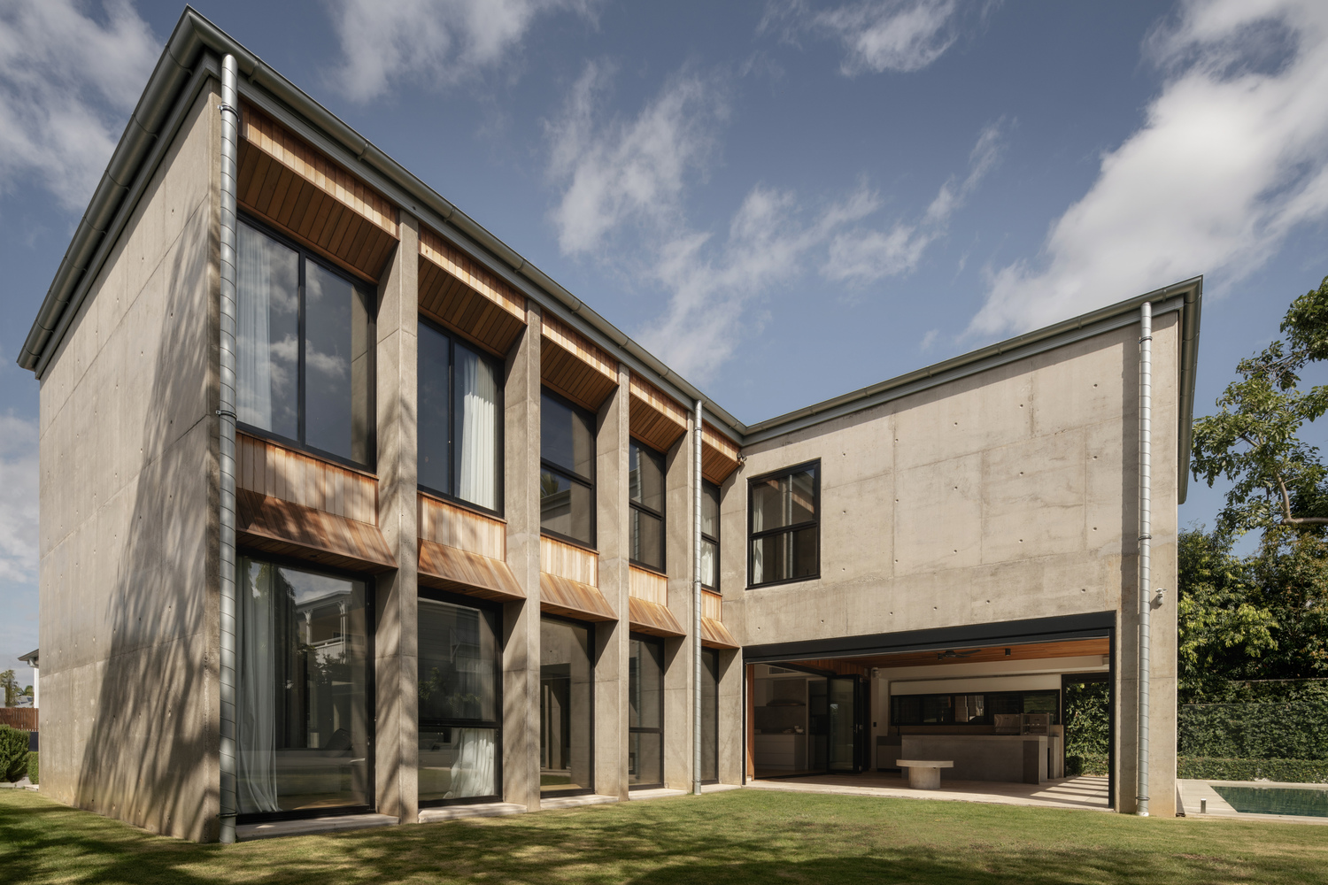 George Kouparitsas Architects Extend Dohori House with Cast-Concrete Volumes Behind Its Preserved Pre-War Facade