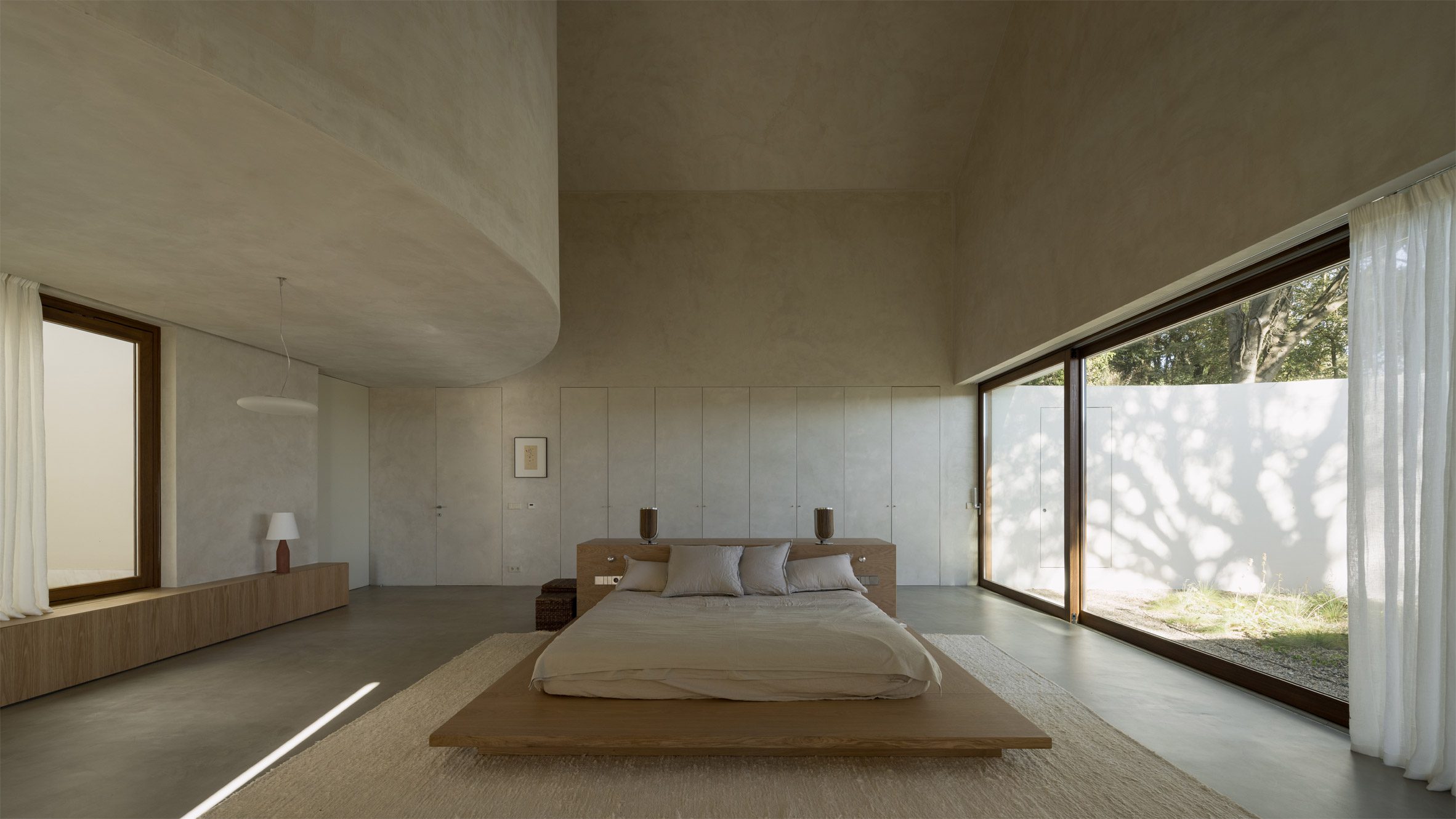 Symmetry In Sound: A Winery Reborn As A Minimalist Home And Studio For Two Musicians