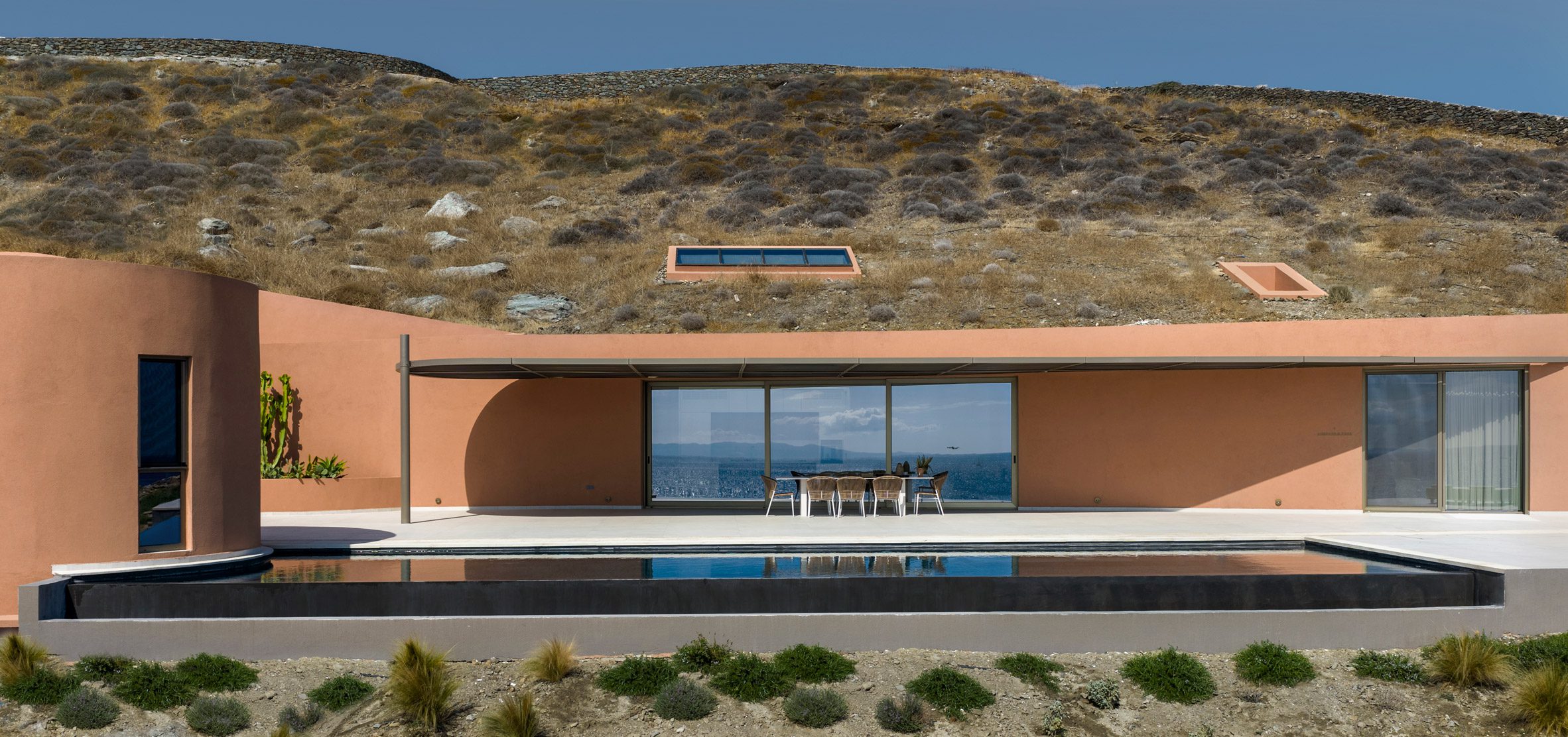 Where Stone Meets Sea: Ateno Architecture Studio Buries Olen Resort In Greece’s Rugged Coast