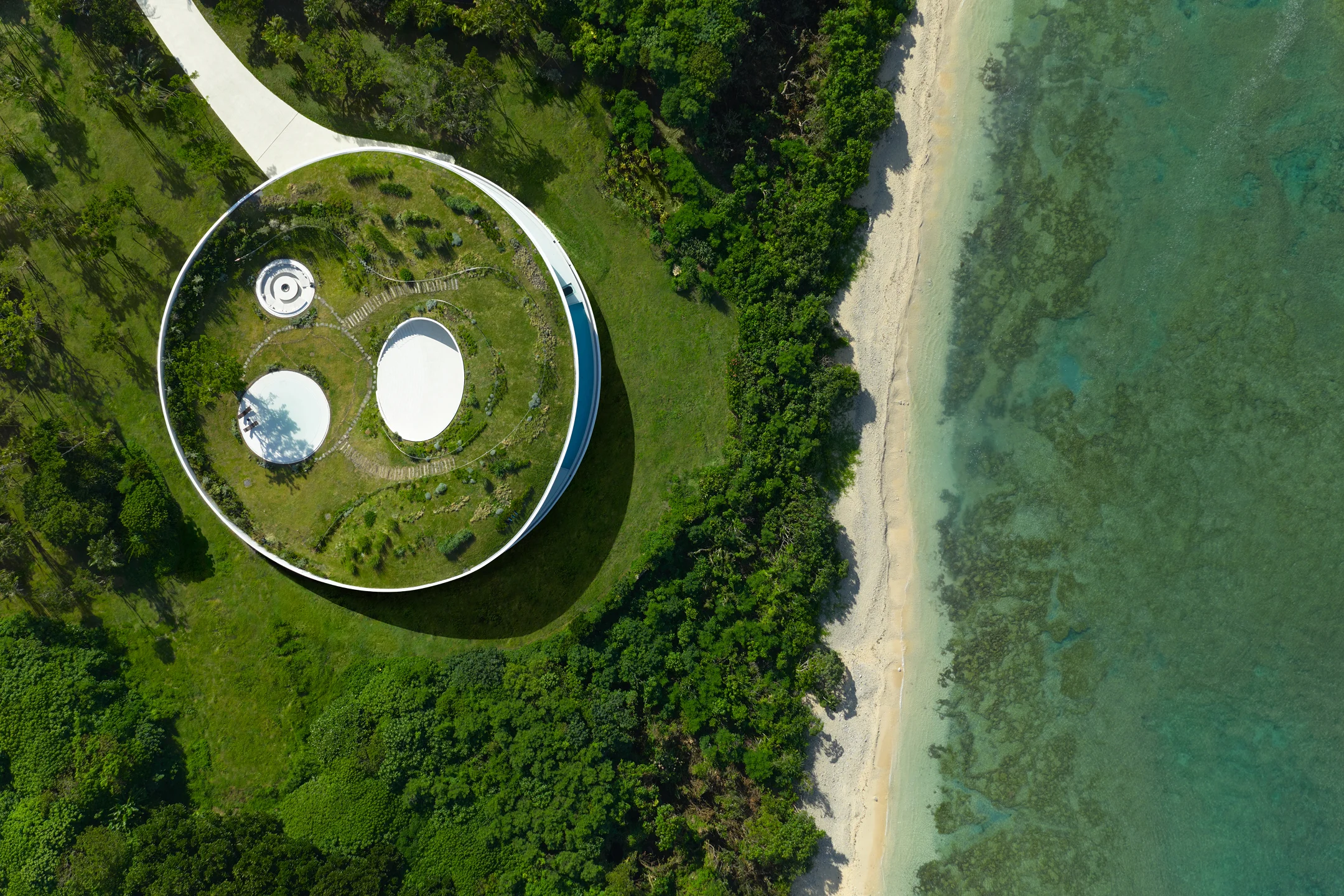 Sou Fujimoto Creates Immersive Coastal Retreat for NOT A HOTEL in Okinawa