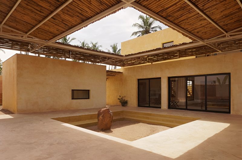 Rhythmic Shadows: Aznar Tailly Orchestrates a Tropical Dialogue in Villa Mondoukou