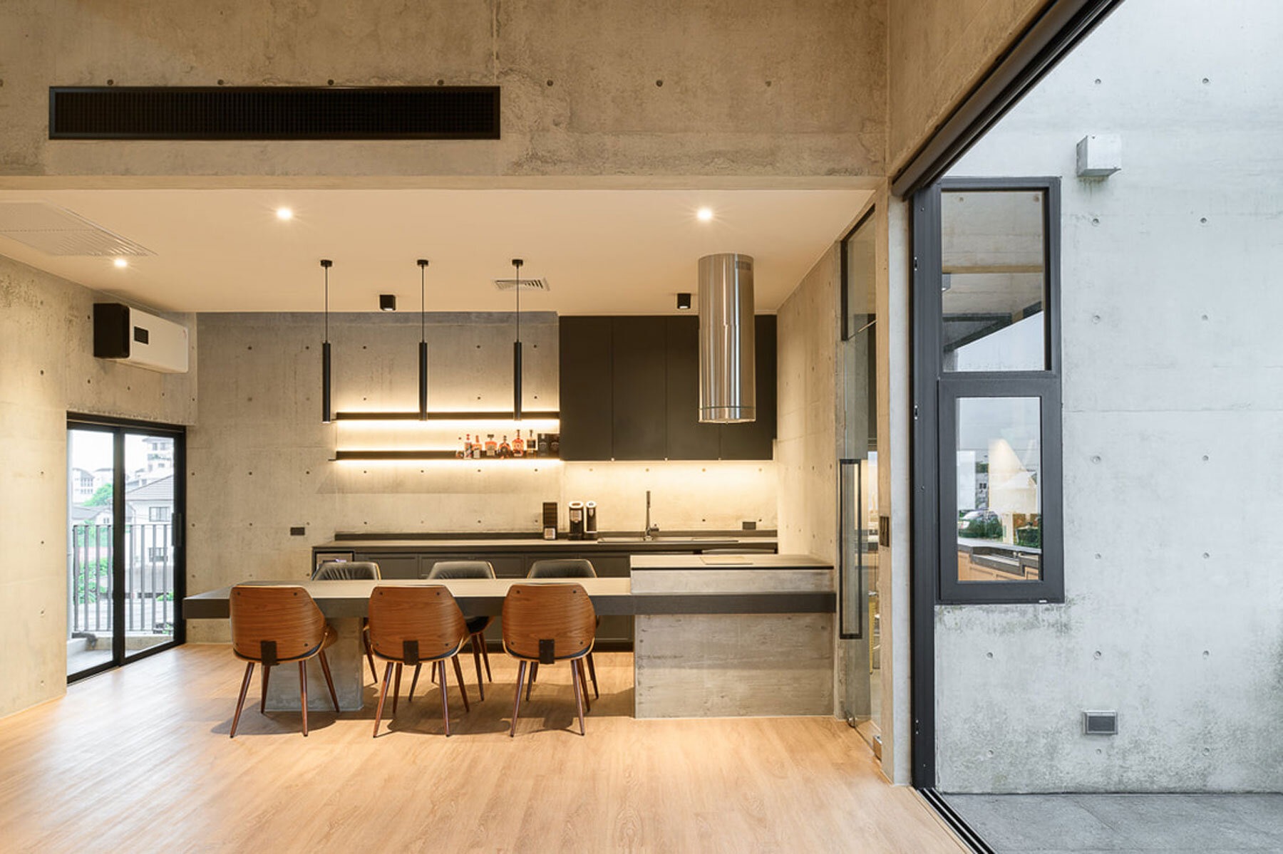 Studio Krubka Overcomes Bangkok Urban Density with Concrete Structure and Green Courtyard Core