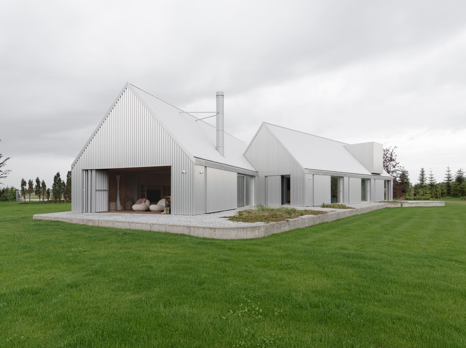 Utility Structures as Architectural Precedent: A Polish Lake House Reimagines Vernacular Forms