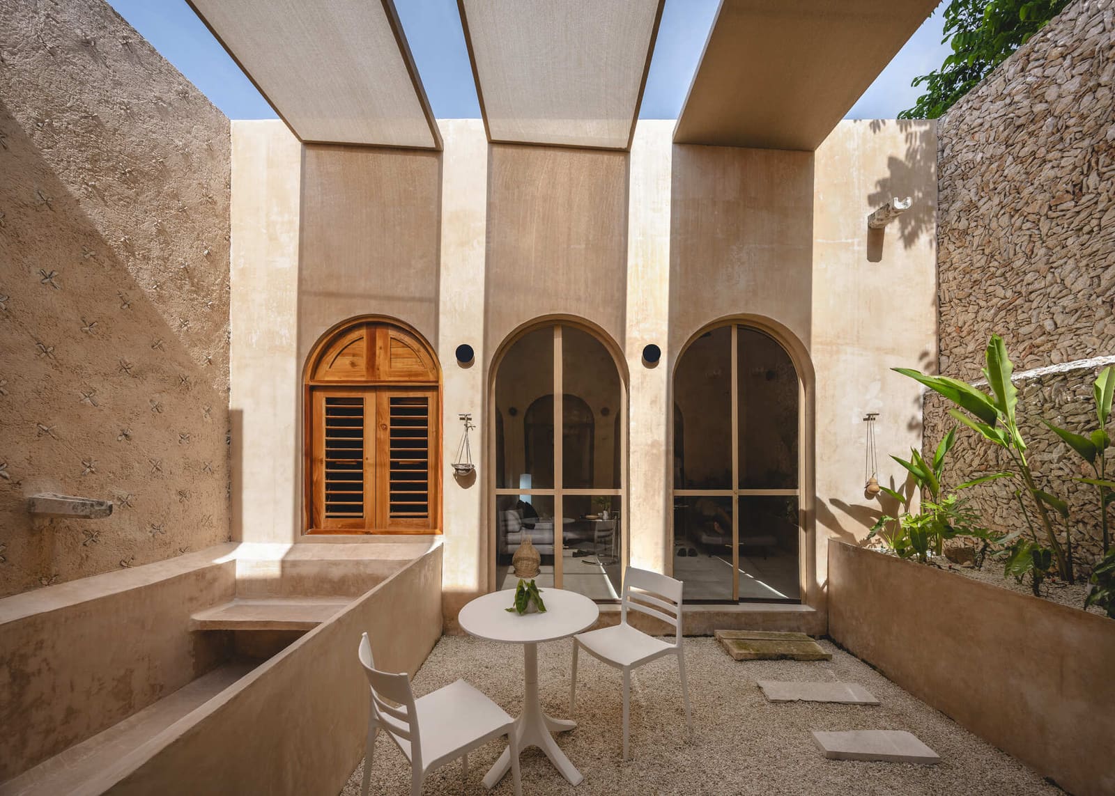 When Subtraction Creates More: A 1960s Home Carved Open to Light